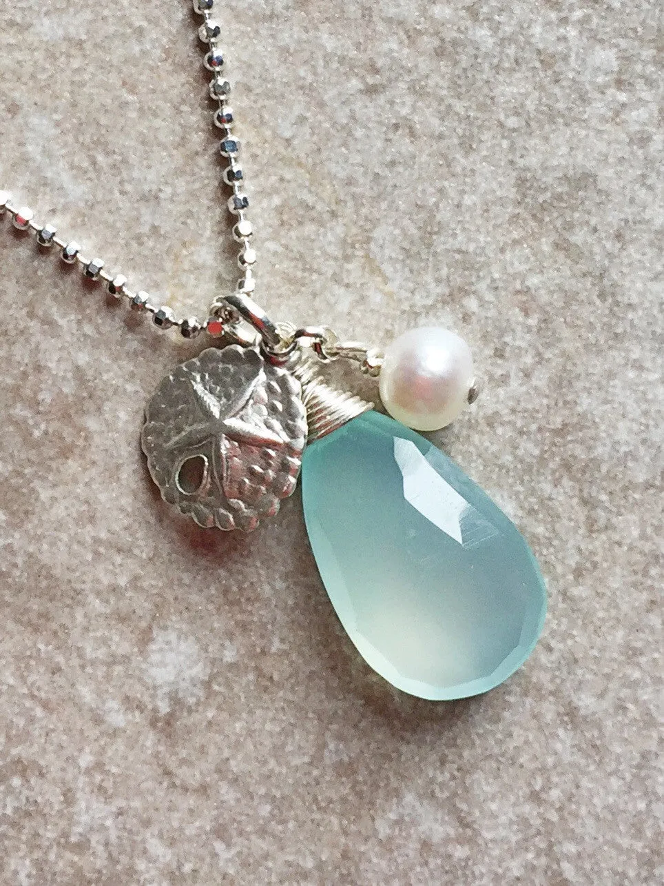 Aqua chalcedony sand dollar pendant necklace