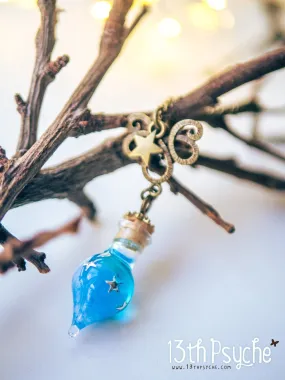 Glow in the dark blue teardrop vial pendant necklace